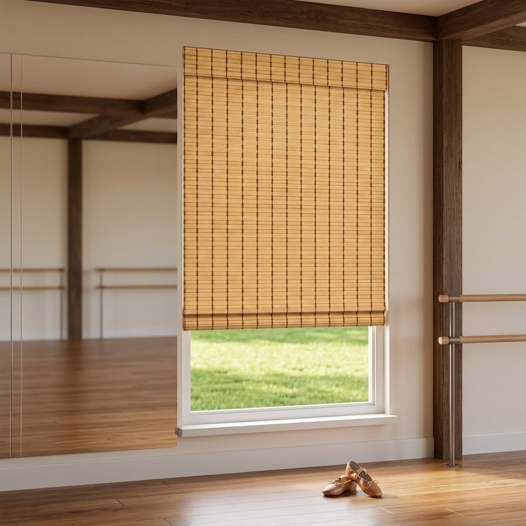 Natural bamboo shade over a window in a wood-paneled room